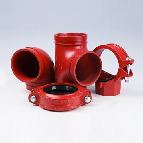 A selection of red ductile iron grooved couplings and pipe fittings